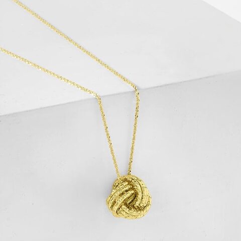Ross-Simons Italian 14kt Yellow Gold Textured Love Knot Pendant Necklace. 18 inches