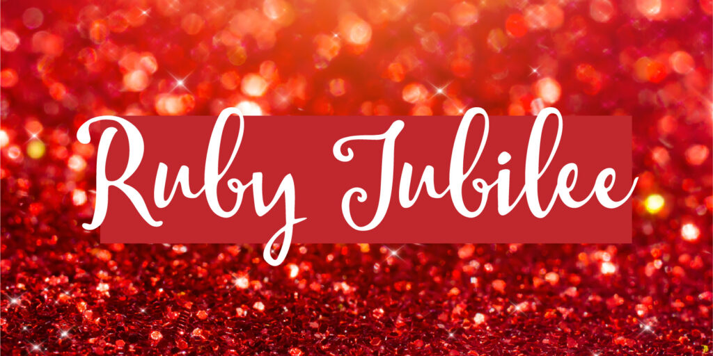 Depth of field image of red sparkles with a text overlay that read "Ruby Jubilee"