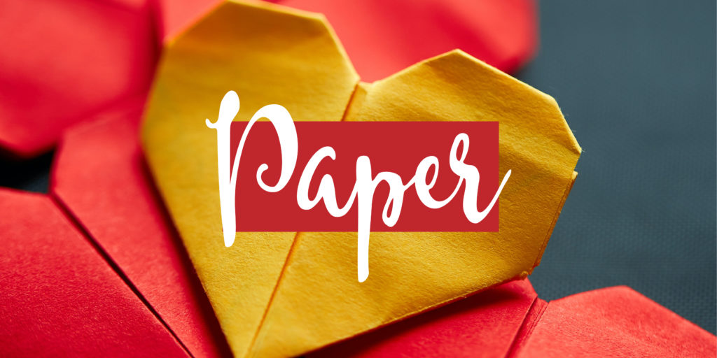 Folded paper hearts with text overlay that reads "paper"