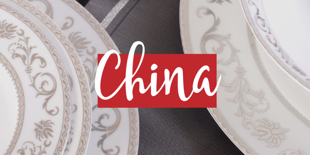 Overhead shot of a formal place setting with a text overlay that reads 'china'